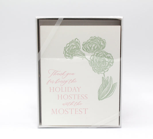 Box of letterpress holiday cards with florals that says "Thank you for being the holiday hostess with the mostest" by Rust Belt Love