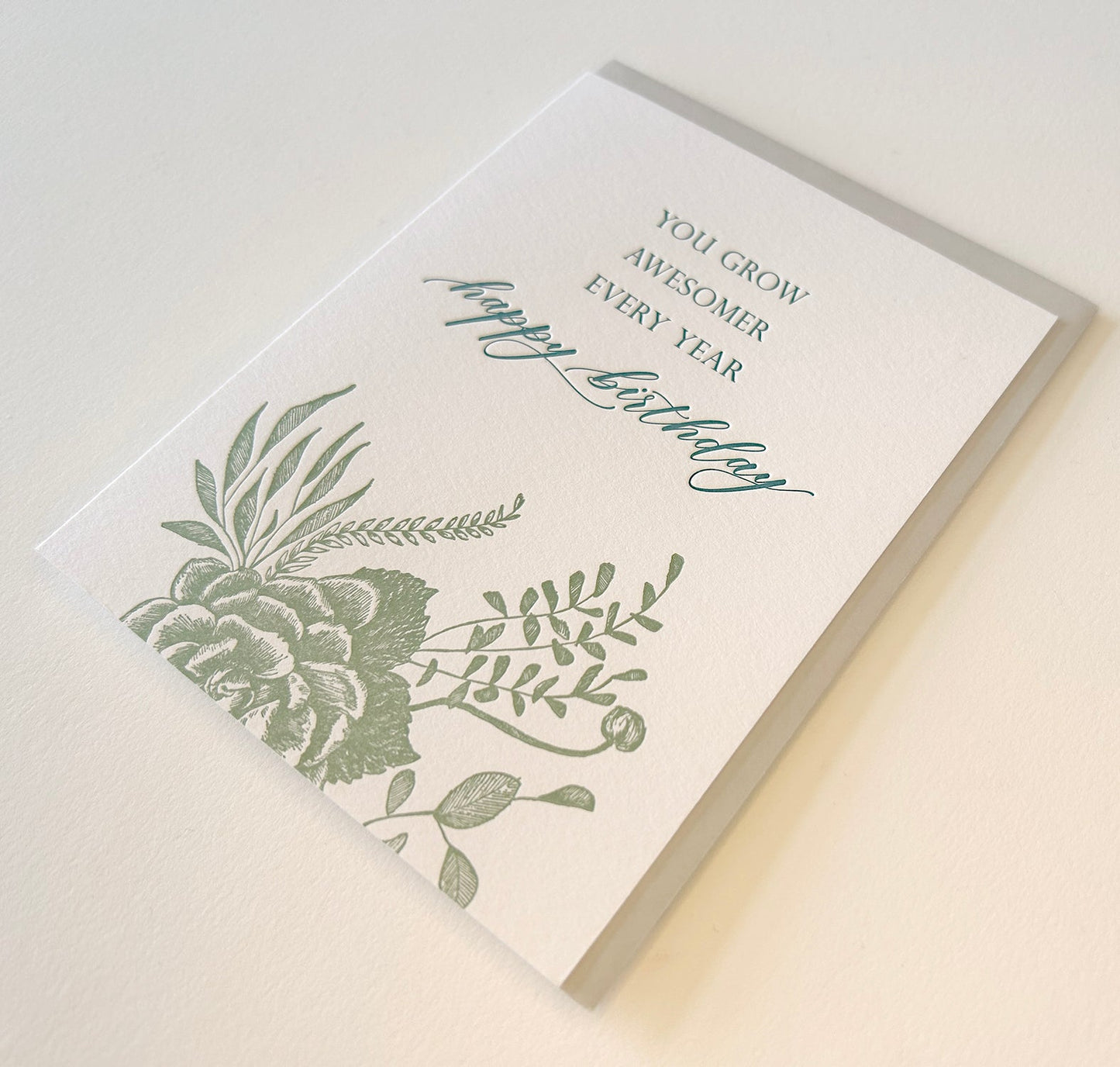 Letterpress birthday card with florals that says " You grow awesomer every year happy birthday" by Rust Belt Love