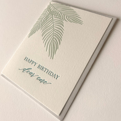 Letterpress birthday card with leaves in the corner that says "Happy Birthday Dear One" by Rust Belt Love