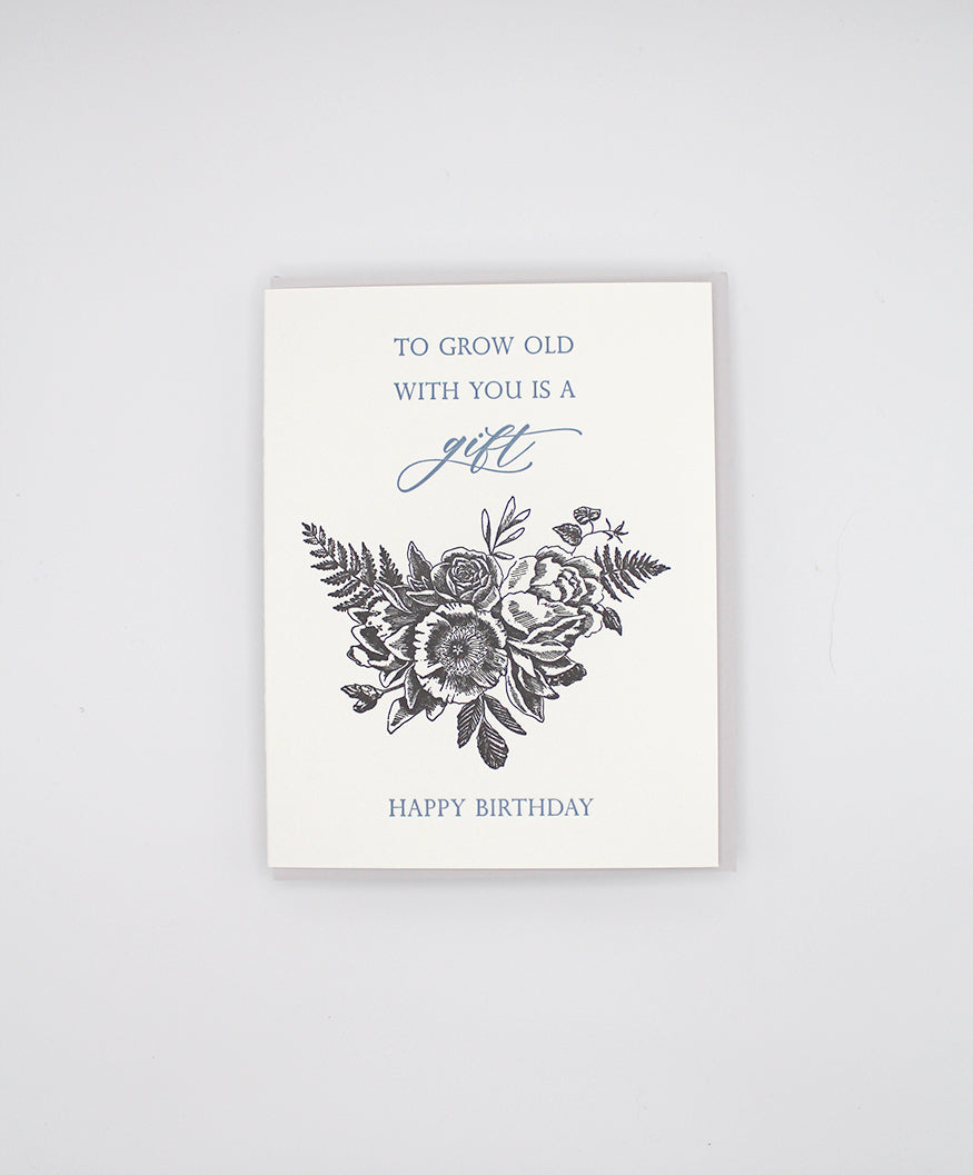 Letterpress birthday card with black florals that reads "To grow old with you is a gift happy birthday", by Rust Belt Love
