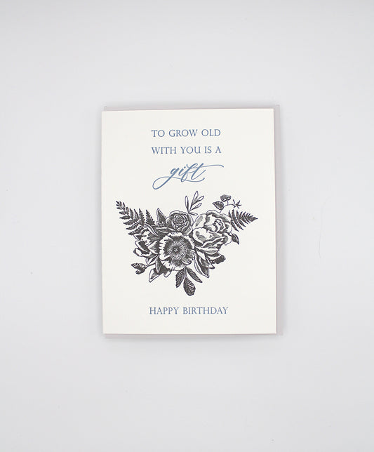 Letterpress birthday card with black florals that reads "To grow old with you is a gift happy birthday", by Rust Belt Love