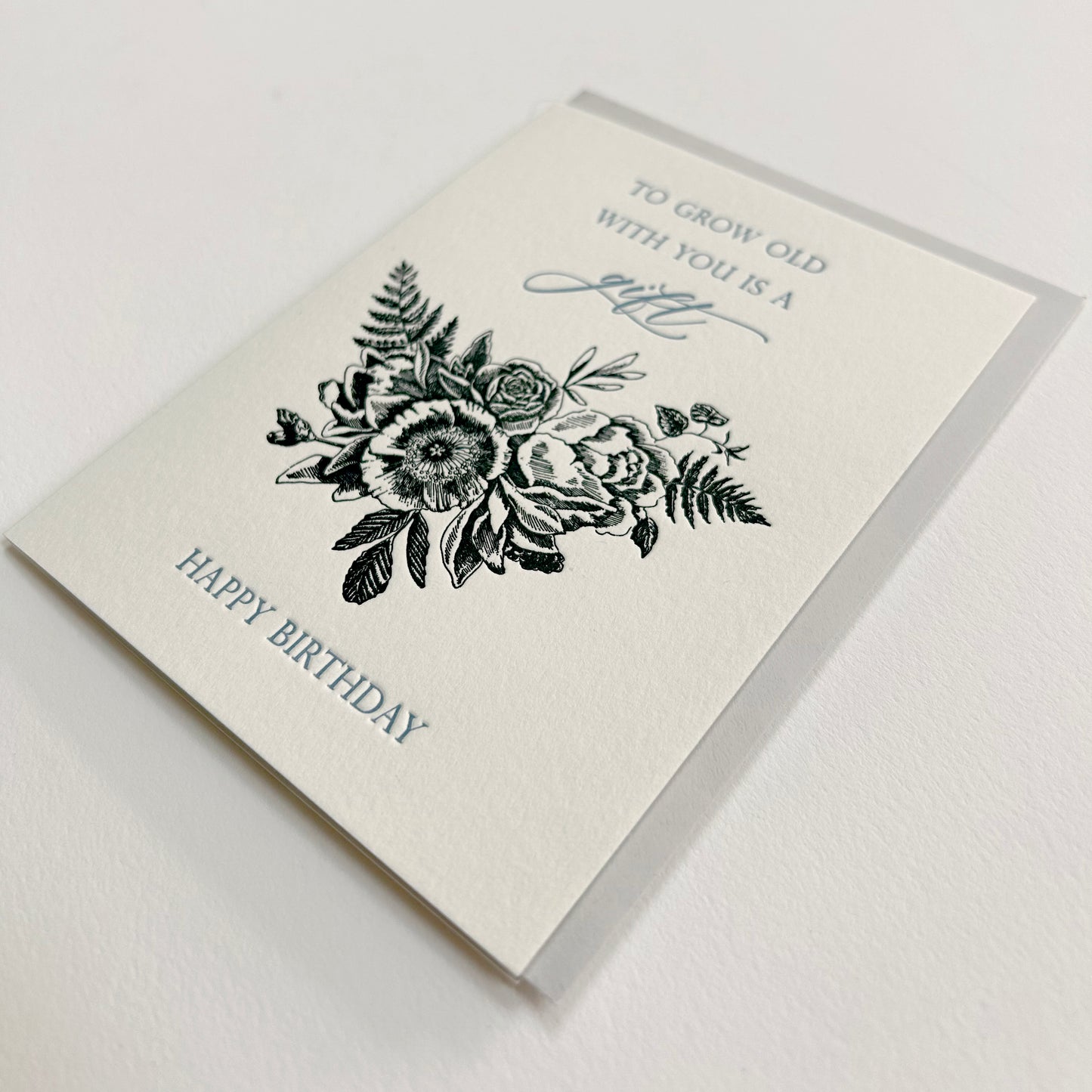 Letterpress birthday card with black florals that reads "To grow old with you is a gift happy birthday", by Rust Belt Love