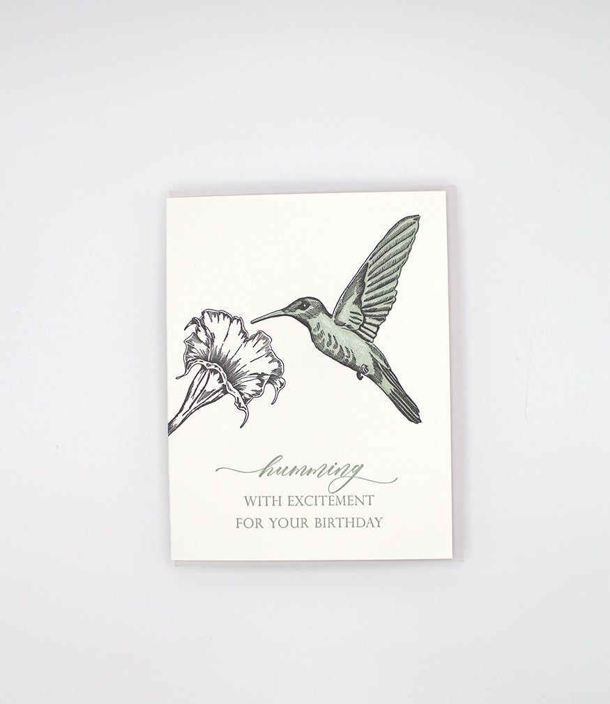 Letterpress birthday card with a flower and humming bird that reads "humming by with excitement for you birthday", by Rust Belt Love