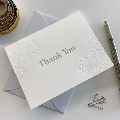 Letterpress thank you card with blind florals that says "Thank you" by Rust Belt Love