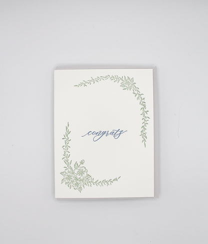 Letterpress congrats card with greenery that says "Congrats" in the middle by Rust Belt Love