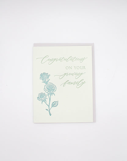 Letterpress congrats card with florals that says "Congratulations On Your Growing Family" by Rust Belt Love