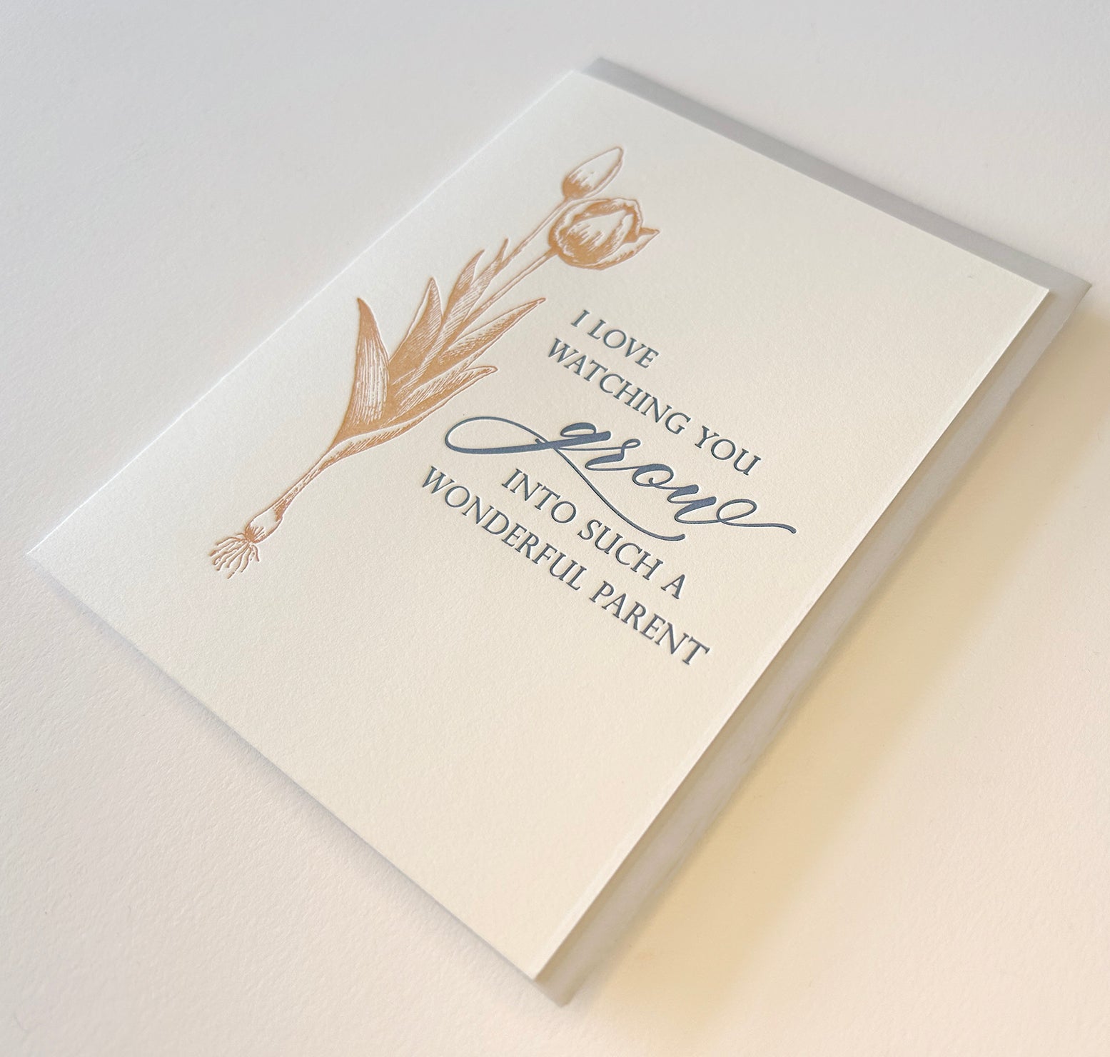 Letterpress encouragement card with florals that says "I love watching you grow into such a wonderful parent" by Rust Belt Love