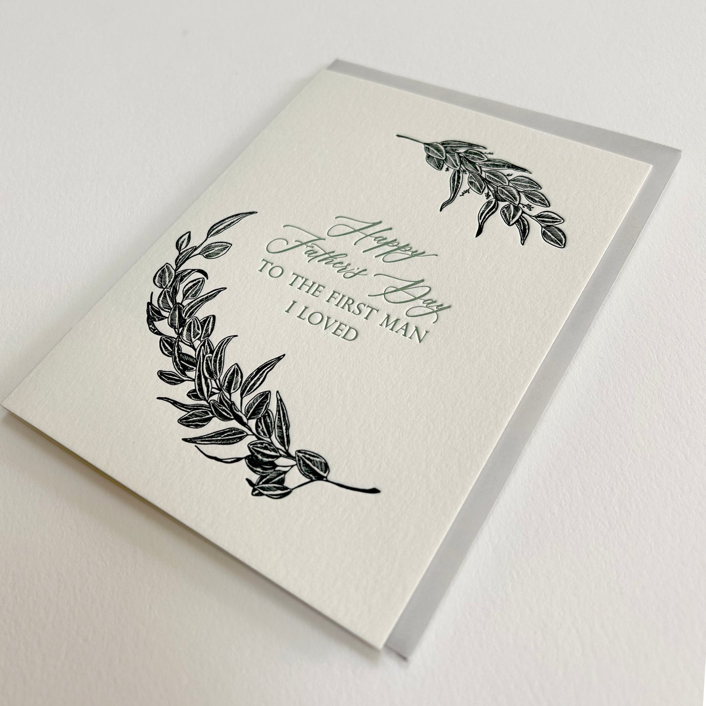 Letterpress card with greenery that reads "Happy Father's Day to the first man i loved" by Rust Belt Love