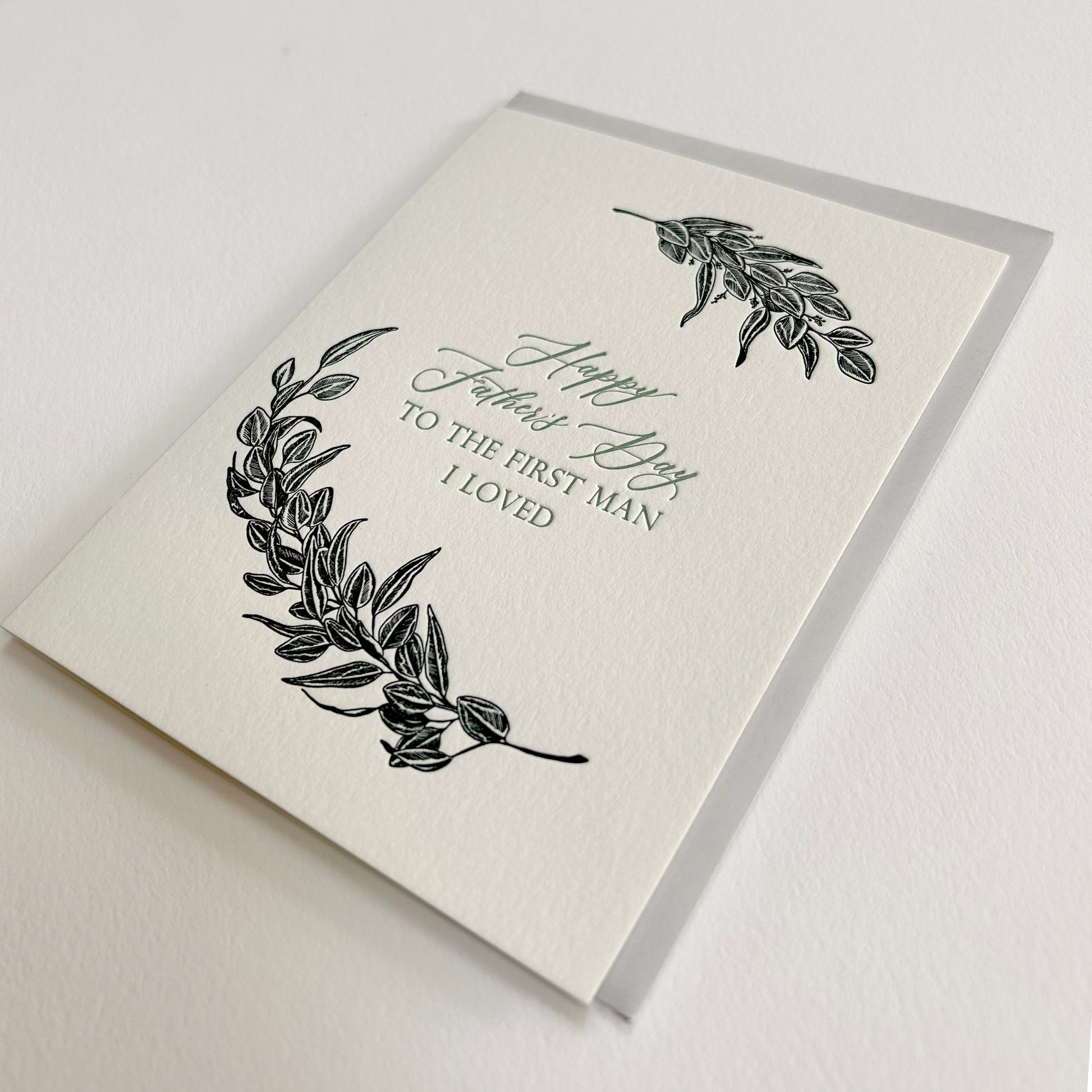 Letterpress card with greenery that reads "Happy Father's Day to the first man i loved" by Rust Belt Love