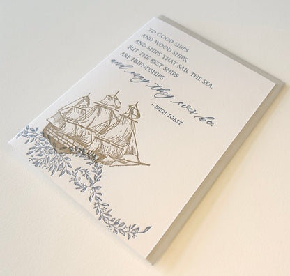 Letterpress friendship card with florals and a ship that says "'To good ships and wood ships, and ships that sail the sea. But the best ships are friendships and may they ever be.- Irish Toast'" by Rust Belt Love