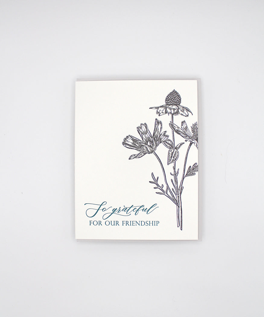 Letterpress friendship card with black florals that reads "so grateful for our friendship", by Rust Belt Love