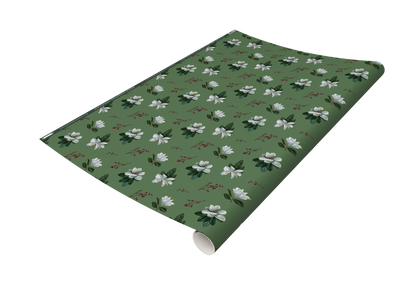 Roll of green wrapping paper printed with magnolia pattern from Rust Belt Love