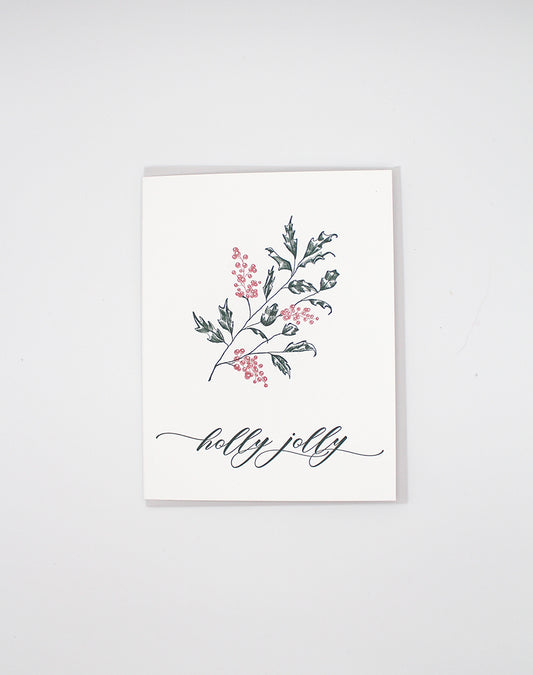 Letterpress holiday card with holly that says "holly jolly" by Rust Belt Love