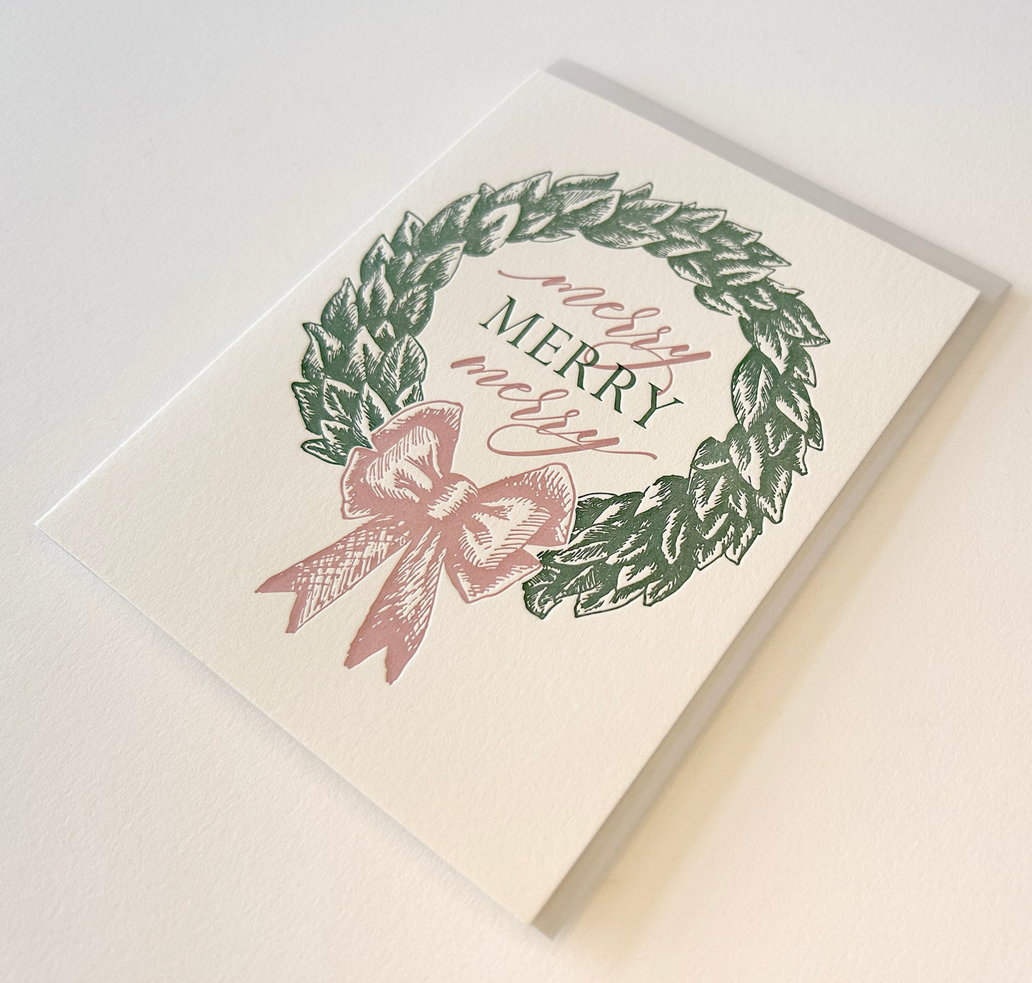 Letterpress holiday card with wreath that says "Merry merry merry" by Rust Belt Love