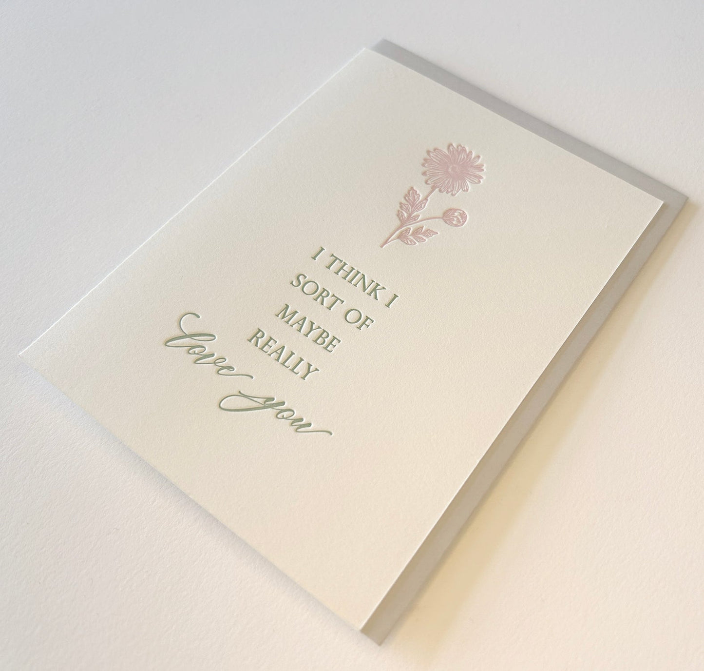 Letterpress love card with florals that says "I think I sort of maybe really love you" by Rust Belt Love