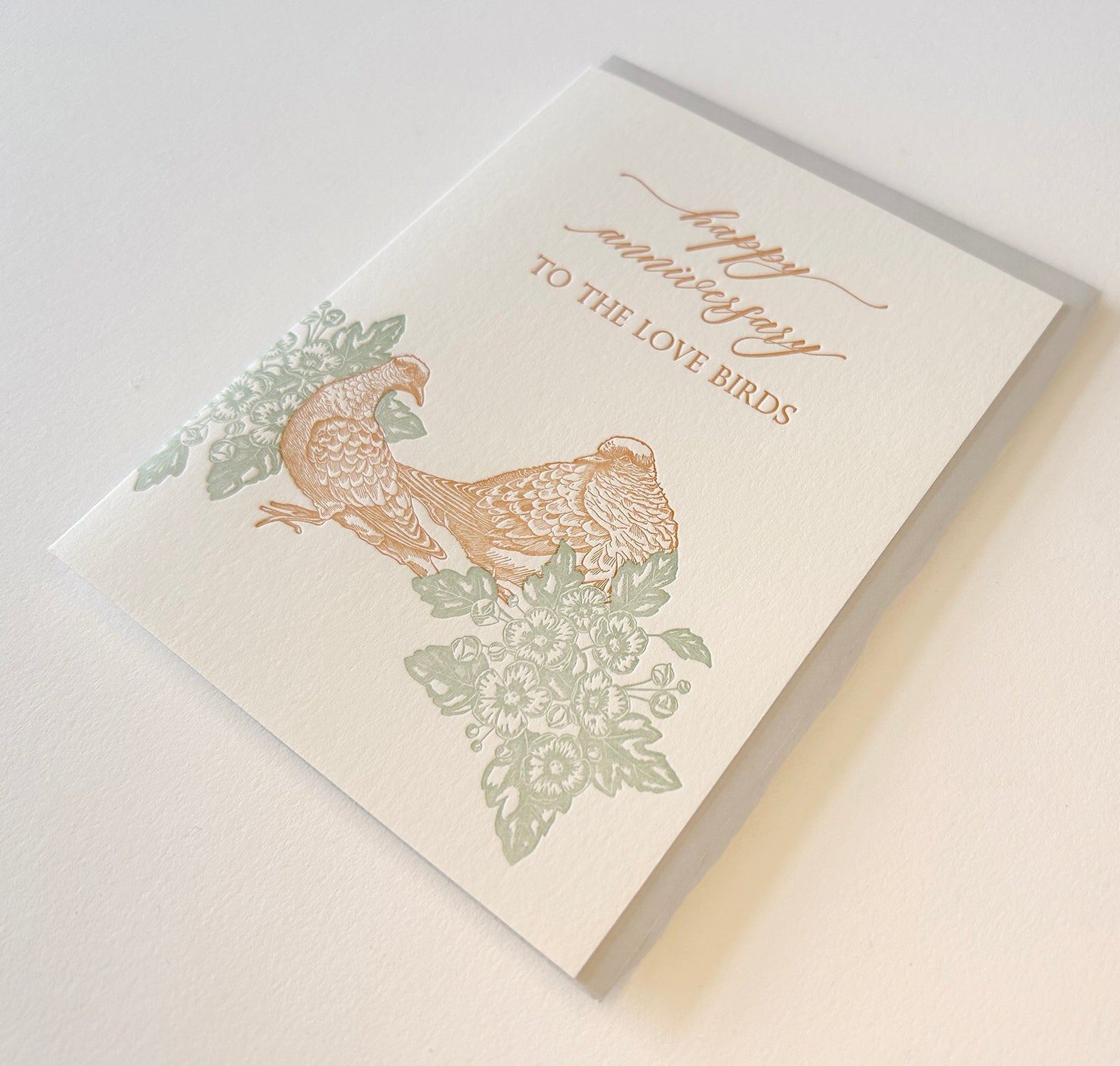 Letterpress love card with florals and birds that says "Happy anniversary to the love birds" by Rust Belt Love