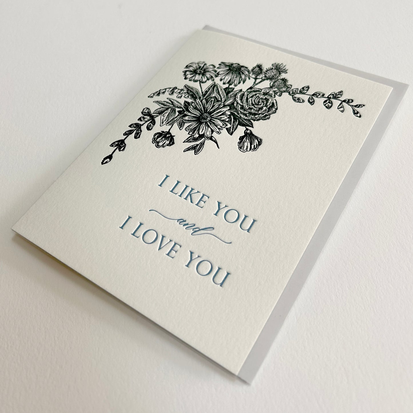 Letterpress love greeting card with florals that reads"I like you and I love you", by Rust Belt Love