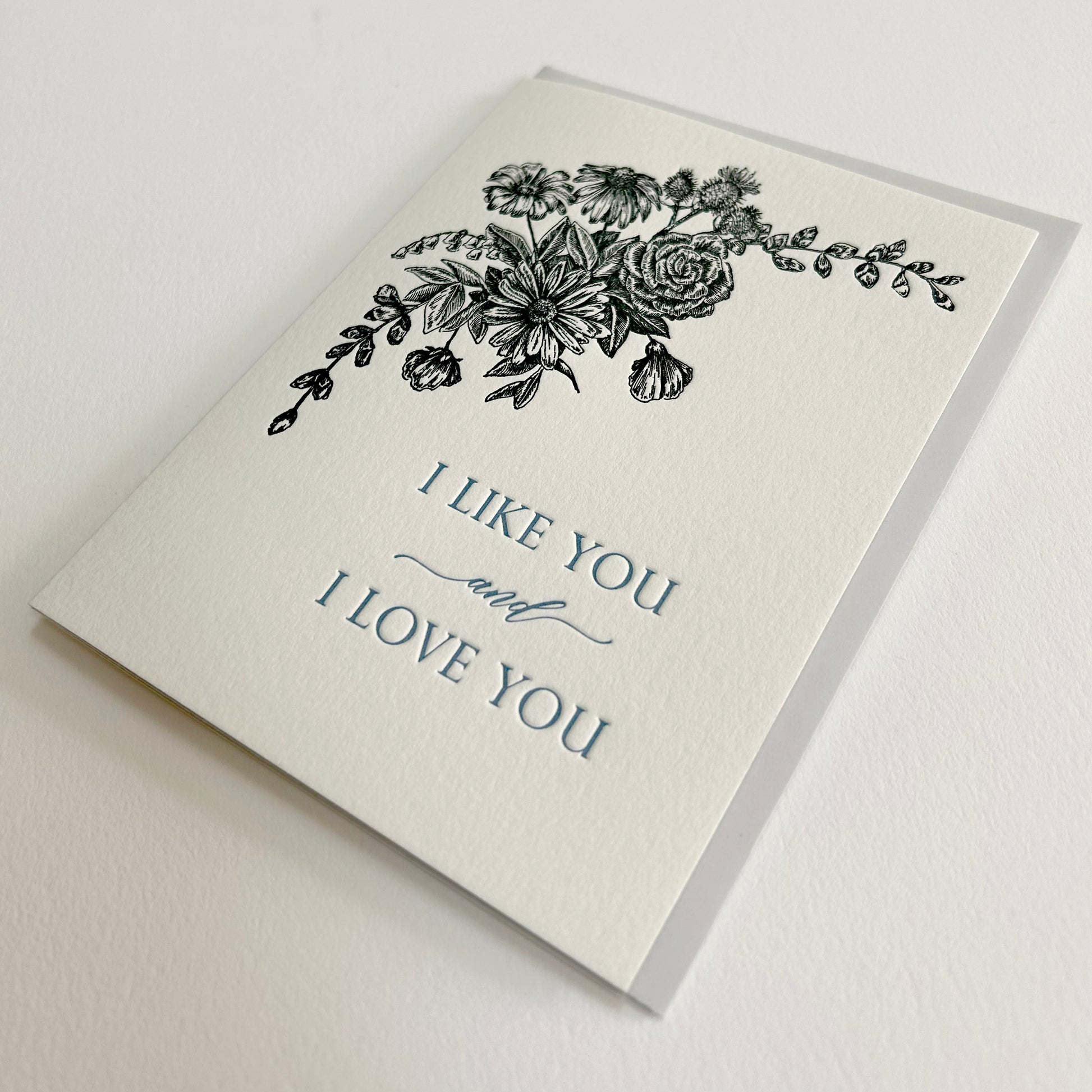Letterpress love greeting card with florals that reads"I like you and I love you", by Rust Belt Love
