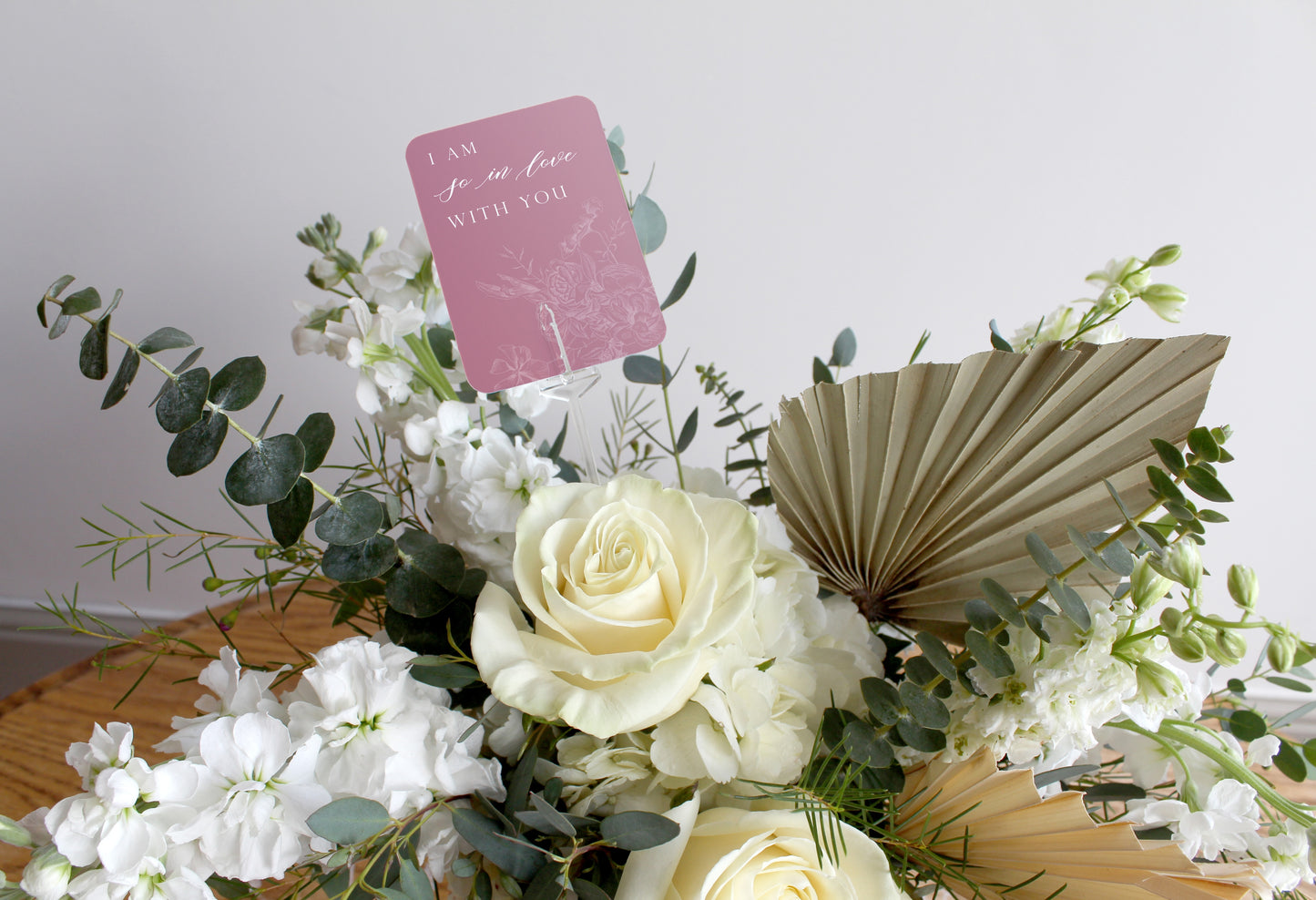 Pink minicard with florals that reads " I am so in love with you", in a bouquet of flowers, by Rust Belt Love