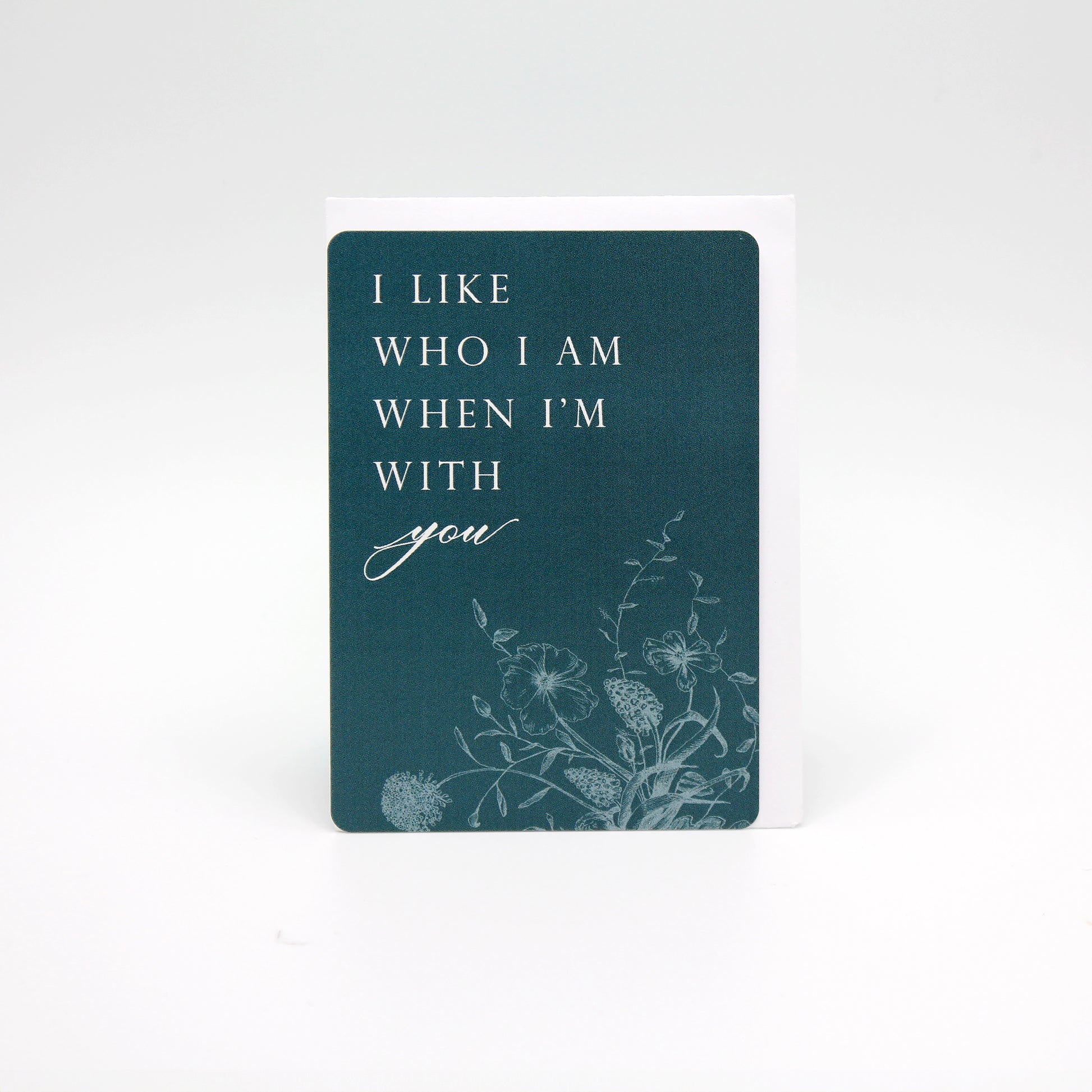 Dark teal floral minicard that reads "I like who I am when I'm with you" from Rust Belt Love
