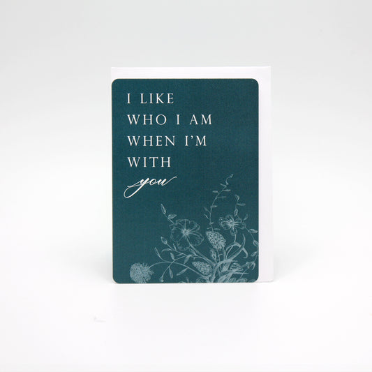 Dark teal floral minicard that reads "I like who I am when I'm with you" from Rust Belt Love