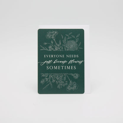 Dark green floral minicard that reads "Everyone needs just because flowers sometimes" from Rust Belt Love