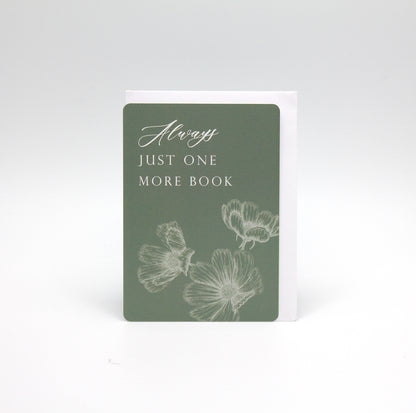 Green minicard with florals that reads "Always just one more book" by Rust Belt Love