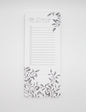 Style shot of a 3.5 by 8.5 notepad with lined sheets with florals that says "My ever-growing to-do list" by Rust Belt Love