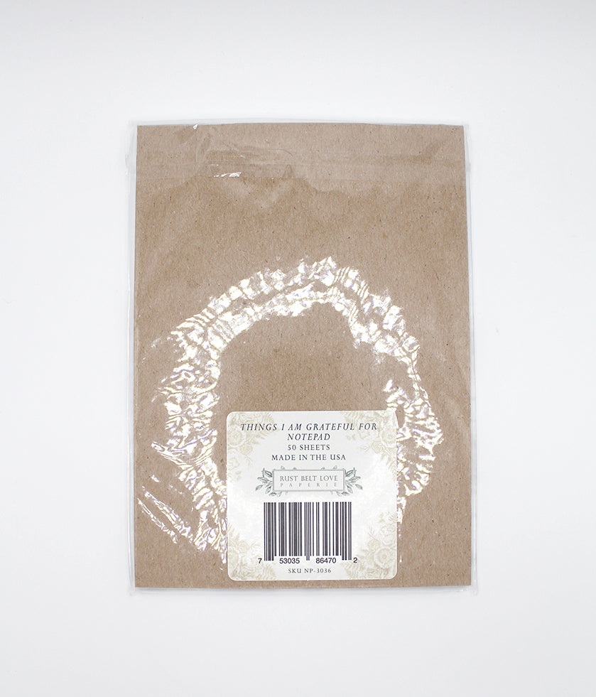 Back of notepad by Rust Belt Love in its'packaging