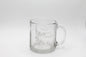 White ink on clear glass mug with flowers and that says "grow wild" by Rust Belt Love