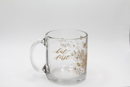 Gold ink on clear glass mug with florals and that says "but first..." by Rust Belt Love