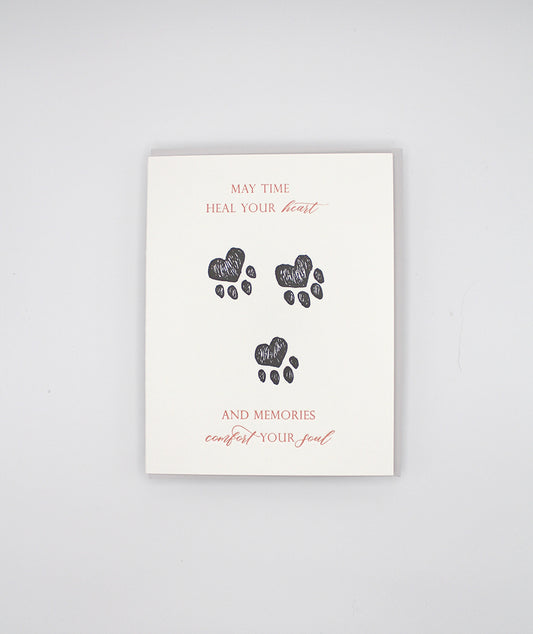 Letterpress sympathy cards with paw prints from Rust Belt Love, that reads "May time heal your heart and memories comfort your soul"