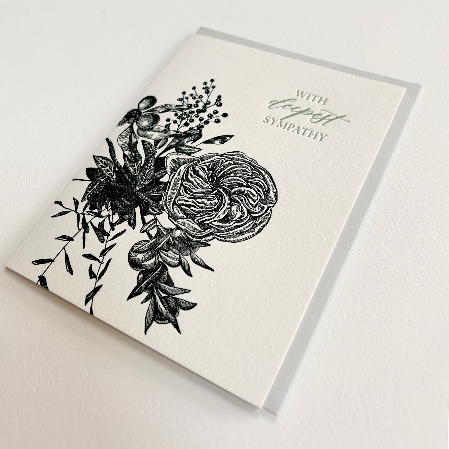 Letterpress sympathy card with black florals that says "With deepest sympathy" by Rust Belt Love