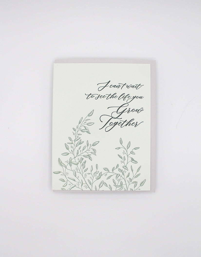 Letterpress wedding card with florals that says "I can't wait to see the life you grow together" by Rust Belt Love