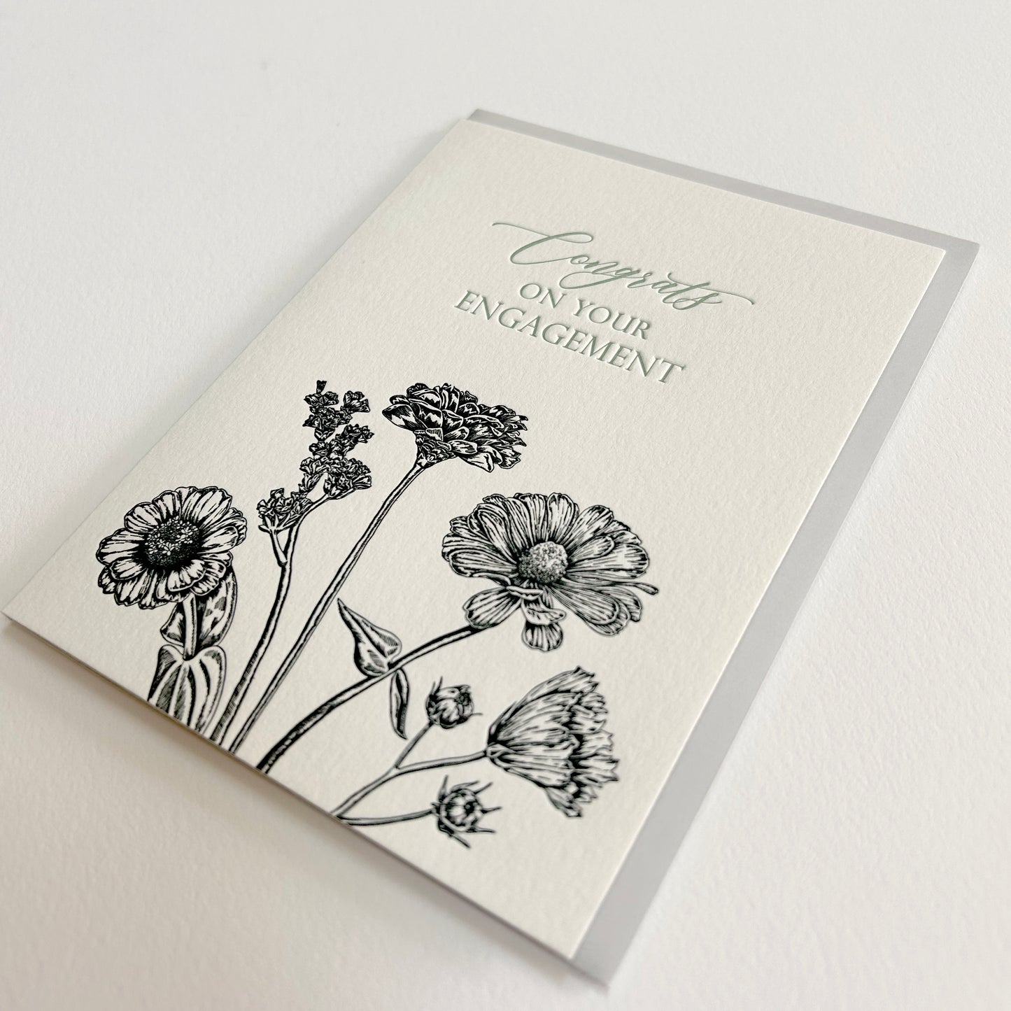 Letterpress congrats card with greenery that says "Congrats" in the middle by Rust Belt Love