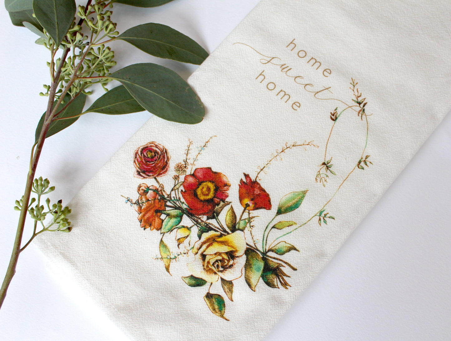 White Tea Towel with florals that says "home sweet home" by Rust Belt Love